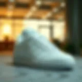 Sophisticated white Adidas footwear on a stylish backdrop