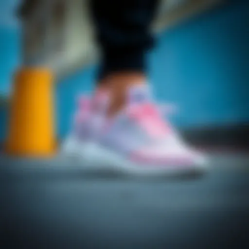 Elegantly designed Adidas Tensaur Run sneakers showcasing their sleek silhouette.