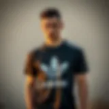 Stylish Adidas t-shirt on a model showcasing modern athletic fashion.