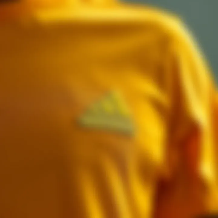 Close-up of Adidas t-shirt fabric emphasizing quality and texture.