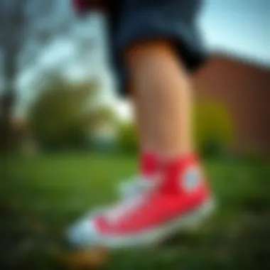 Child wearing Converse shoes during outdoor play