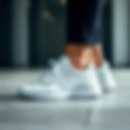 Sleek design of New Balance white sneakers showcasing elegance and modernity