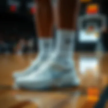 Athlete showcasing white Nike basketball shoes during a game